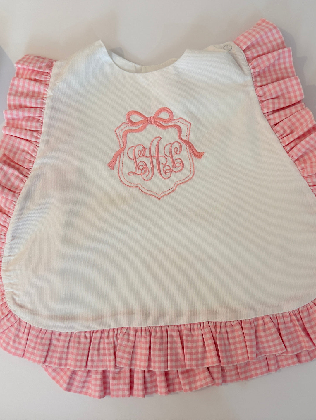 Little Happies Party Bib in Pink Gingham Ruffle