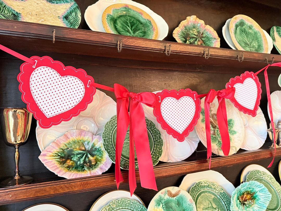 Red Scalloped Hearts with Satin Bows in between!