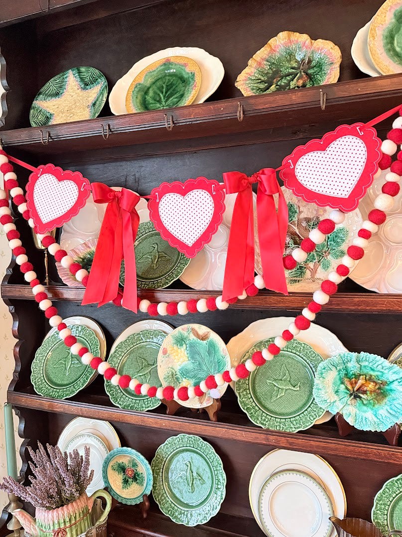 Red Scalloped Hearts with Satin Bows in between!